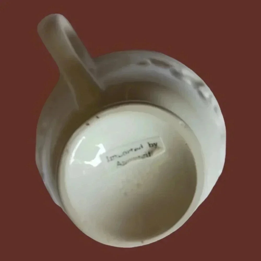 Shabby chic porcelain teacup and saucer